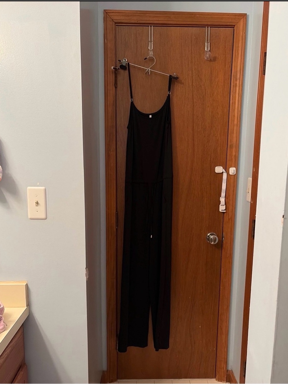 Sleek Black Spaghetti-Strap Jumpsuit